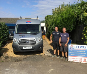 Paul and Tom standing by the van