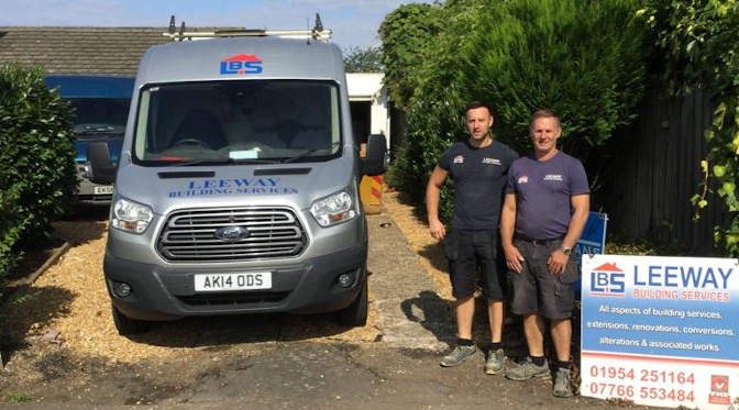 Paul and Tom standing by the van