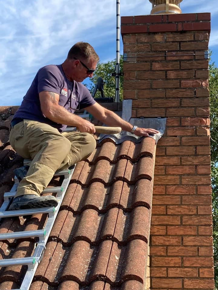 Paul working on the roof